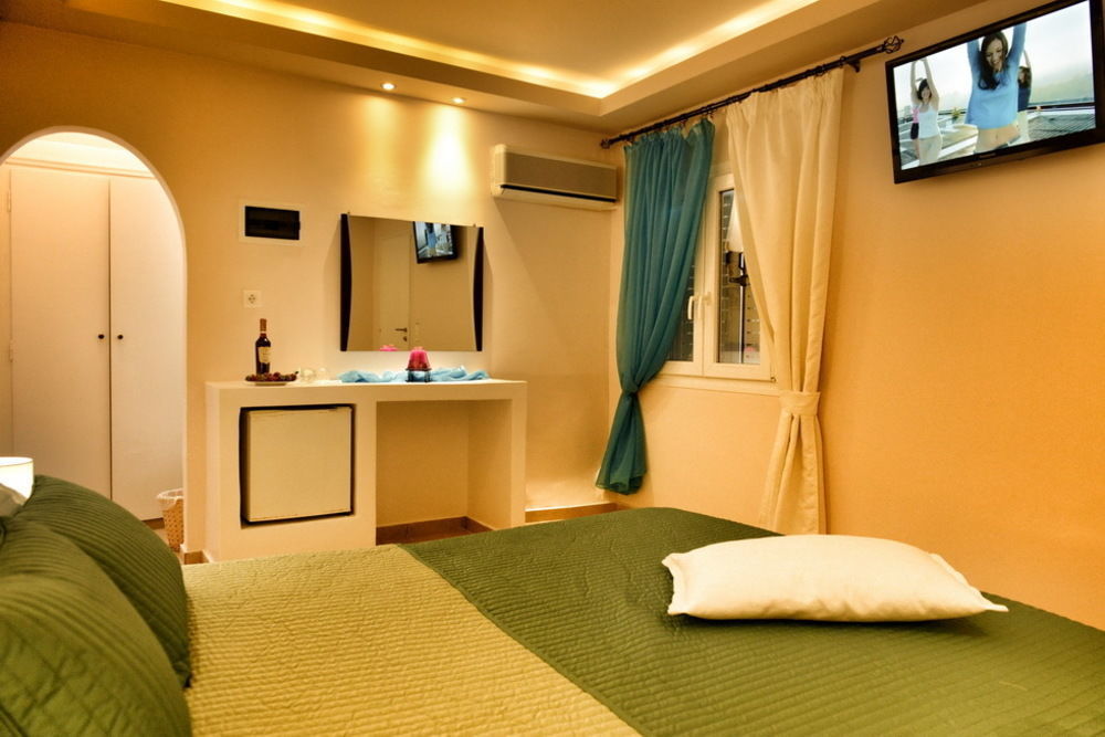Tataki Hotel Тира Экстерьер фото